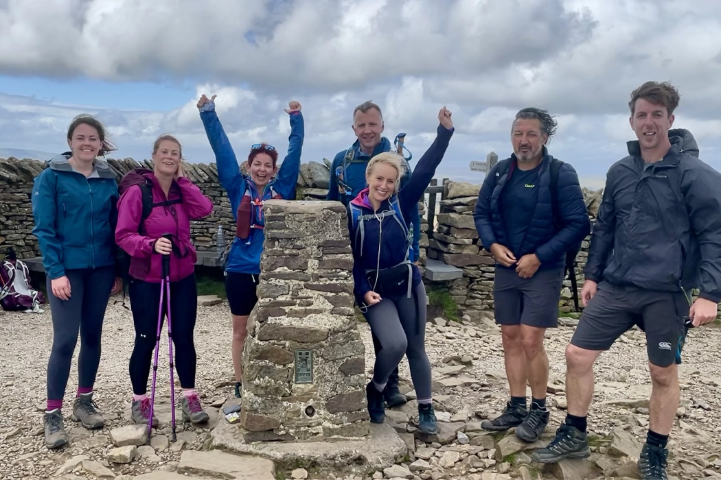 ASL team at a summit trig point on the Yorkshire Three Peaks route, August 2021, fundraising for Alzheimer’s Society.